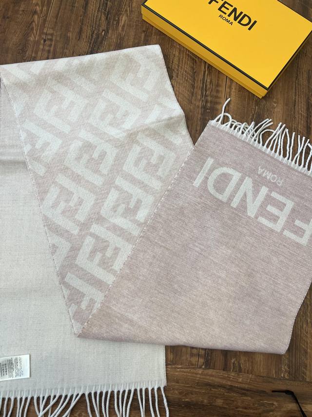 Fendi's latest Big F gradient double-sided scarf in pink. Size: 35 x 190cm. Made