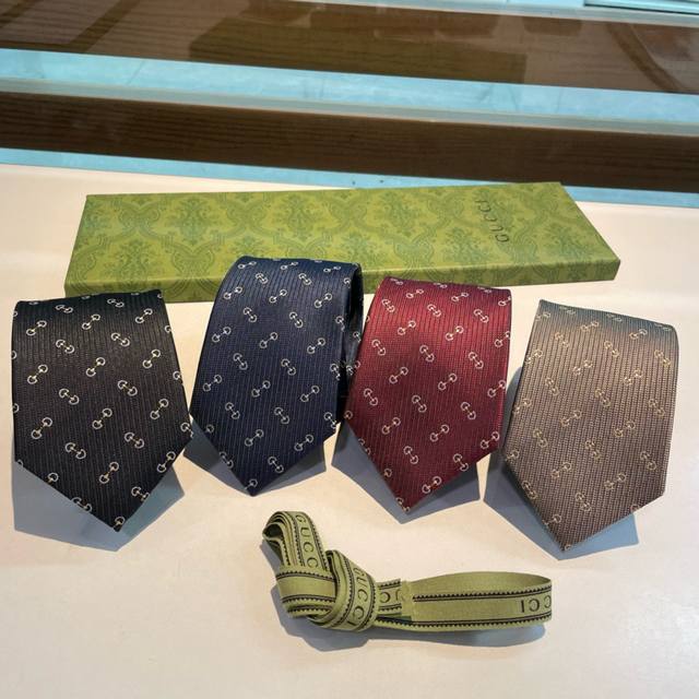 G's new men's tie, featuring a rare jacquard pattern featuring the classic G log