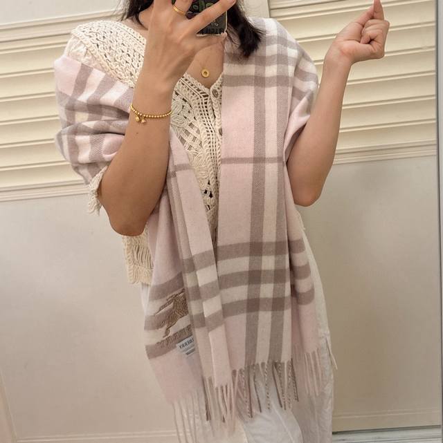 Pink Burberry is pushing a hot-selling classic warhorse check scarf. Highly reco