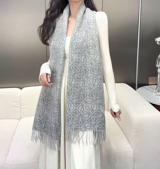 Loewe's latest and hottest scarf for 2025, a double-faced wool and cashmere scar