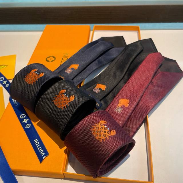 Lv Crab silk tie, dyed in a deep hue, features striking beach animal embroidery,