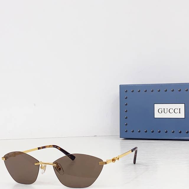 Gucc* Model: Gg2053S Size: 59 ports 17-140