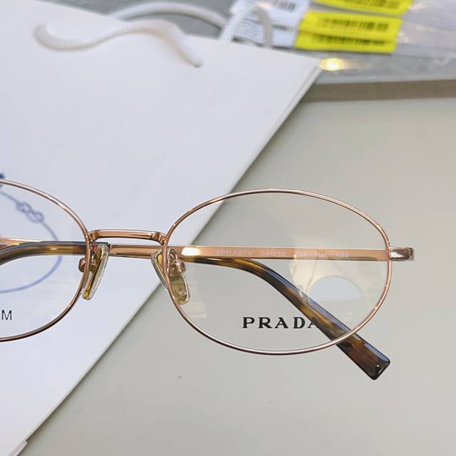 prad* Prada new titanium eyeglass frame, Model: Vpr A57V, Size: 54/19-135