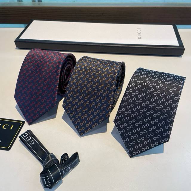 G's new men's tie, featuring a rare jacquard pattern featuring the classic G log