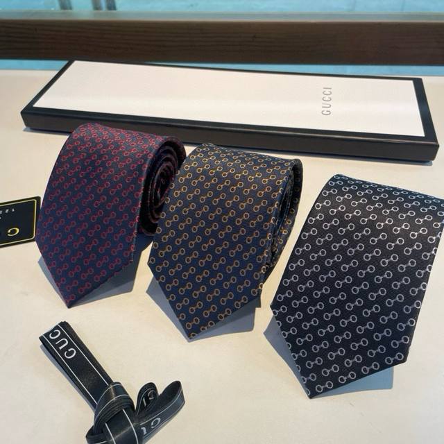 G's new men's tie, featuring a rare jacquard pattern featuring the classic G log