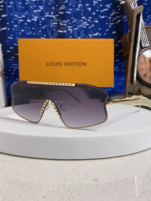 Louisvuitton Louis Vuitton 2025 new polygonal one-piece large frameless sunglass