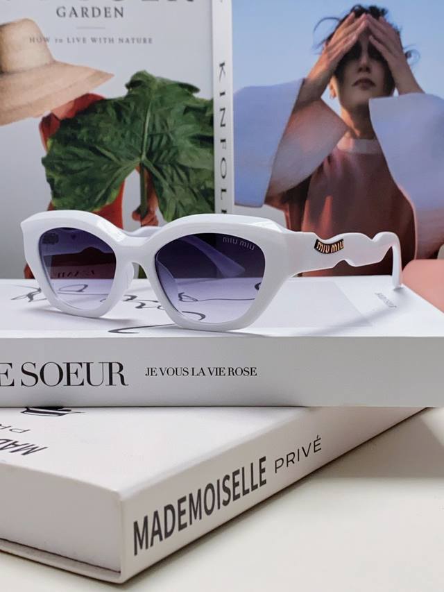 Miumiu 2025 new cat-eye navy blue polyhedron element sunglasses UV protection Tr