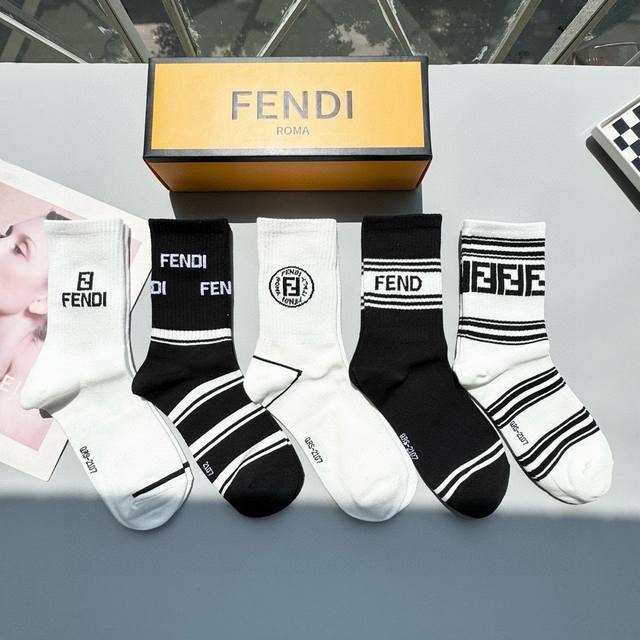 comes with a box of five pairs of Fendi's new high socks with the classic doubl
