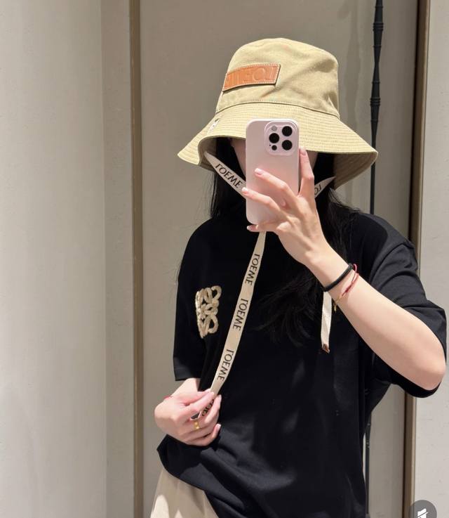 Loewe's personalized bucket hat with straps is an excellent casual bucket hat. I