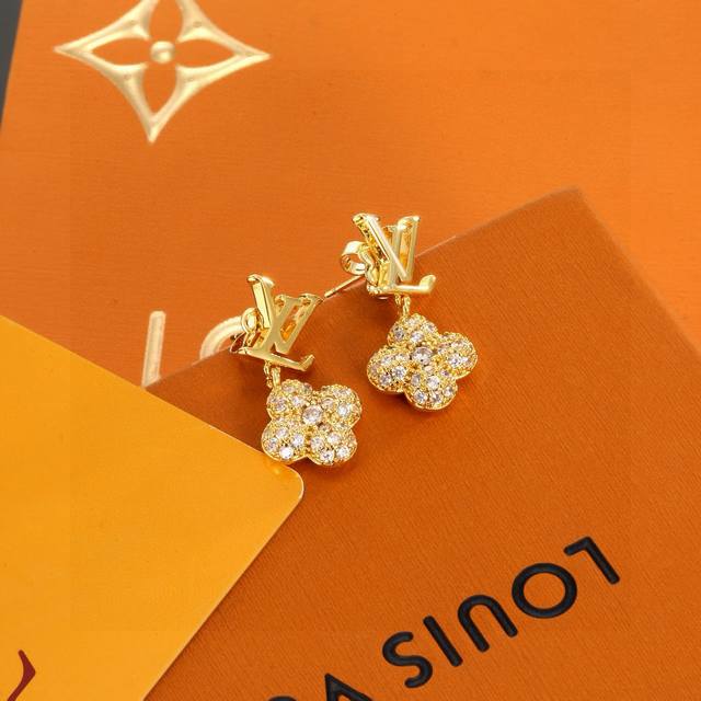 The exquisitely crafted Louis Vuitton earrings, crafted with exquisite craftsma