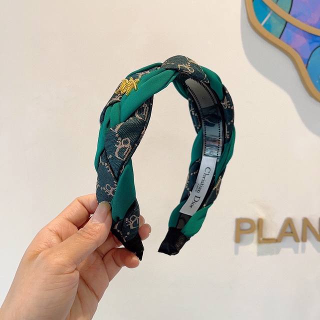 with packaging Dior's new wide-brimmed, high-end headband, a popular online fav