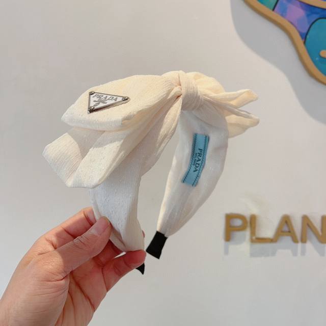 with packaging Prada Prada's new European and American bow trend color headband