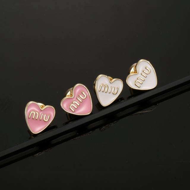 Miu Miu's new heart-shaped peach stud earrings are made of original sterling sil