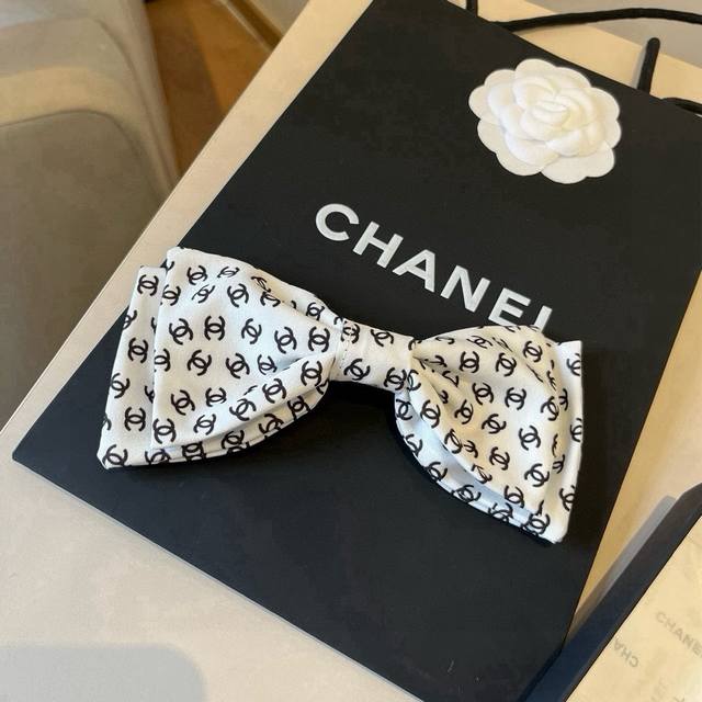 Chanel top shelf bow hairpin
