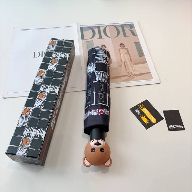 Moschino Moschino Bear Head Handle Tri-Folding Automatic Umbrella is an Italian