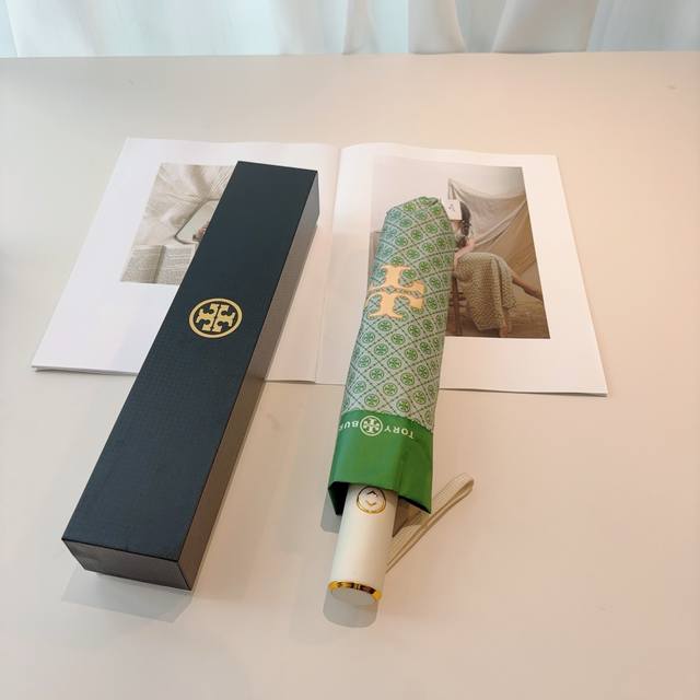 Tory Burch's exclusive first release of the Tory Burch tri-fold, fully automatic