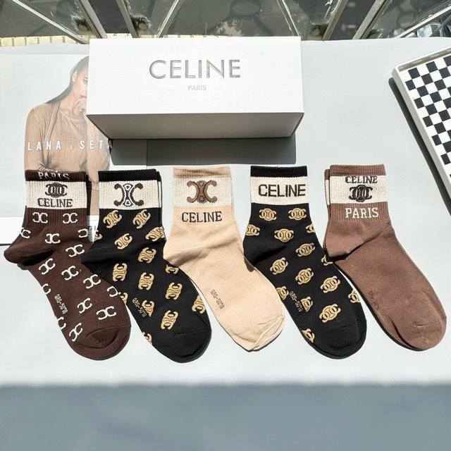 Comes with a box of five pairs of Celine's popular mid-calf socks in the tall v