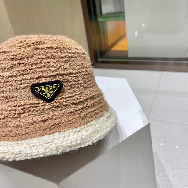 prada Prada wool fisherman hat women's new knitted hat autumn and winter sun hat