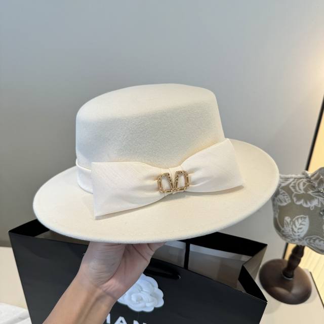 White Valentino new wool hat, flat top hat, 100% wool fabric%, head circumferen