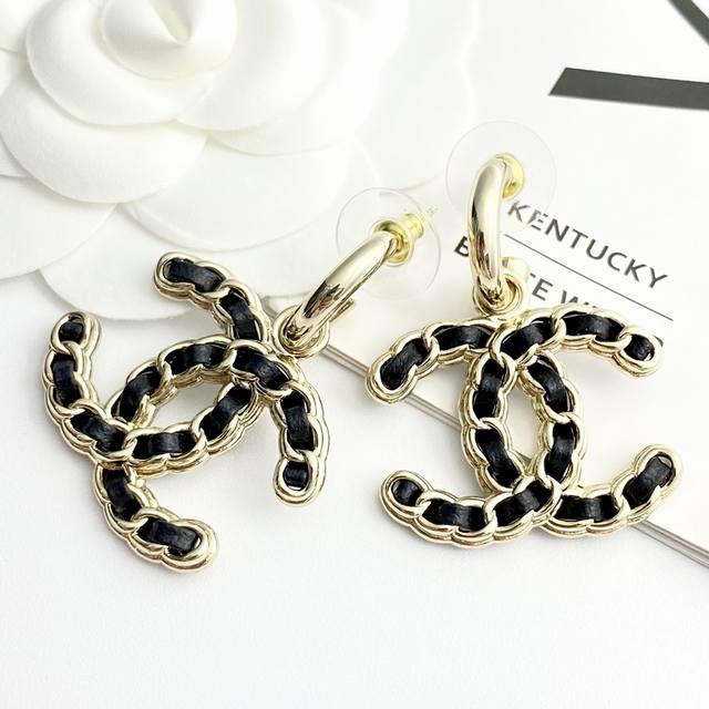 Chanel's hot-selling earrings are now available. Chan 24 black and gold leather