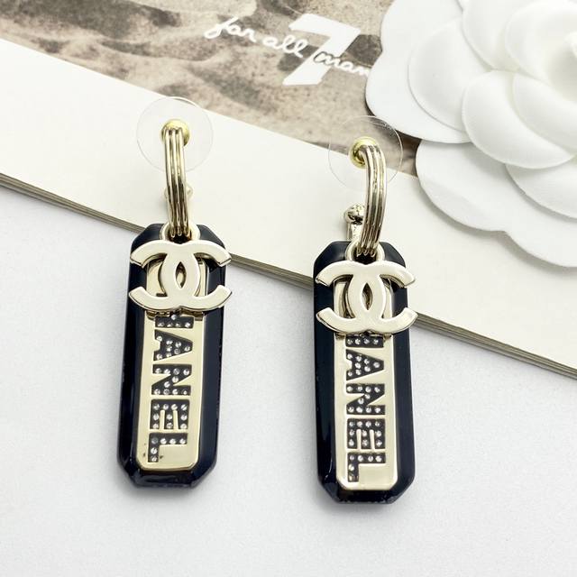 Chanel earrings are hot-selling and are on sale now! Zp Chan 23 black resin lett