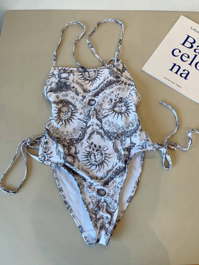 Highly recommended! This Dior one-piece swimsuit features a stylish, trendy anim