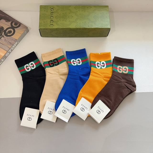 Comes with a box of 5 pairs of Gucci's new early fall mid-calf socks! Made of p