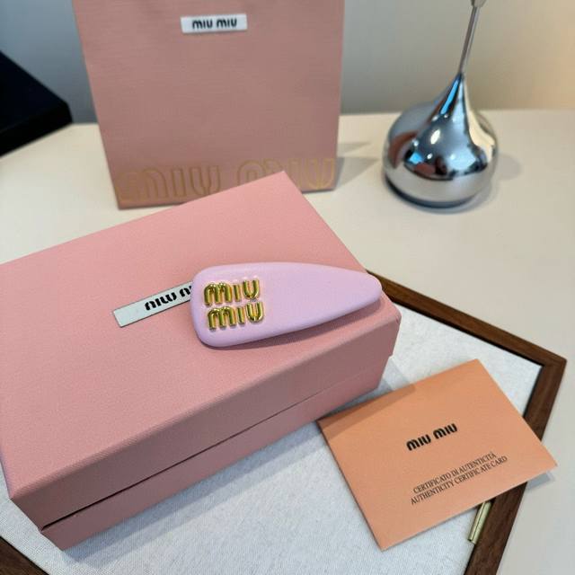 Single Miu Miu hairpin