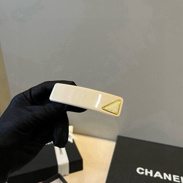 Single Prada hairpin