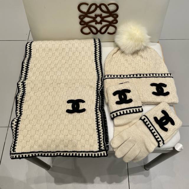 Chanel three-piece wool suit with hat, scarf and gloves! Paired with a fox wool