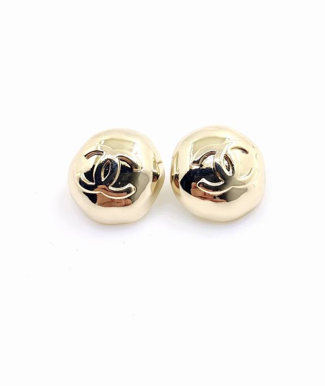 Ch*Nel latest light gold polished hemispherical earrings consistent with Zp bras