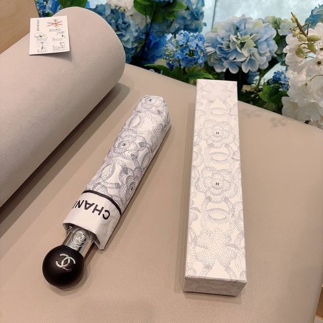 Chanel's new tri-fold automatic folding umbrella is exquisitely crafted, stylish