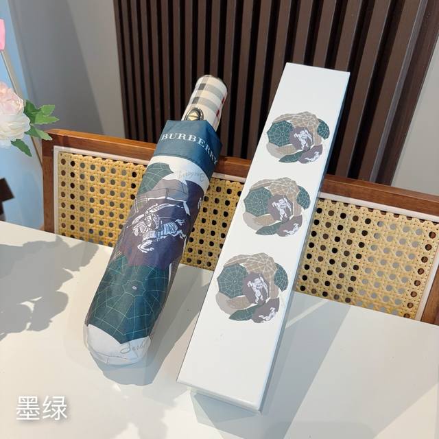 Burberry's Warhorse tri-fold, automatic folding umbrella is the pinnacle of the