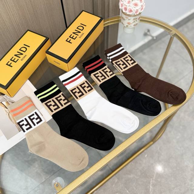 comes with a box of five pairs of Fendi's new high socks with the classic doubl
