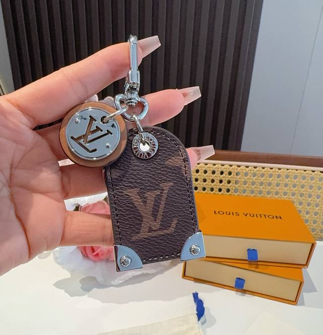 Louis Vuitton Lv Keychain Charm M641 Travel Tag bag charm and keychain embody th
