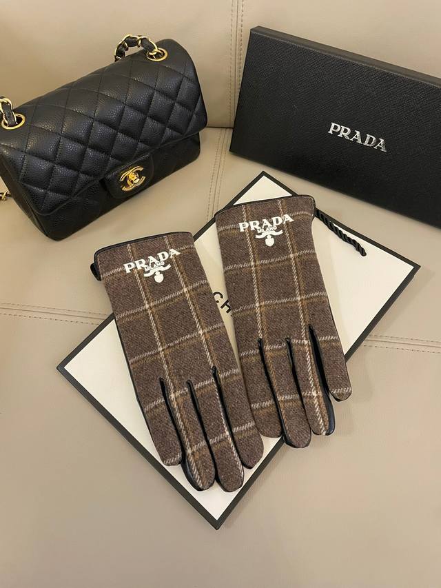 Burberry's new wool and leather gloves can touch the screen. They look great wit