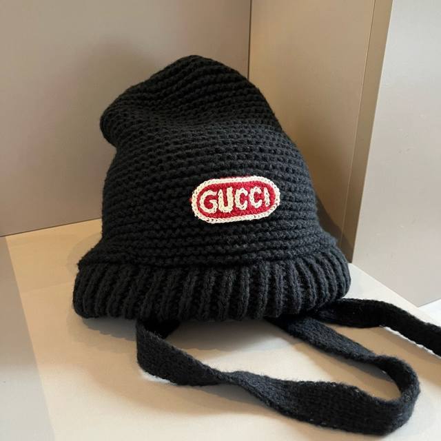 Gucci new knitted beanie with earmuffs