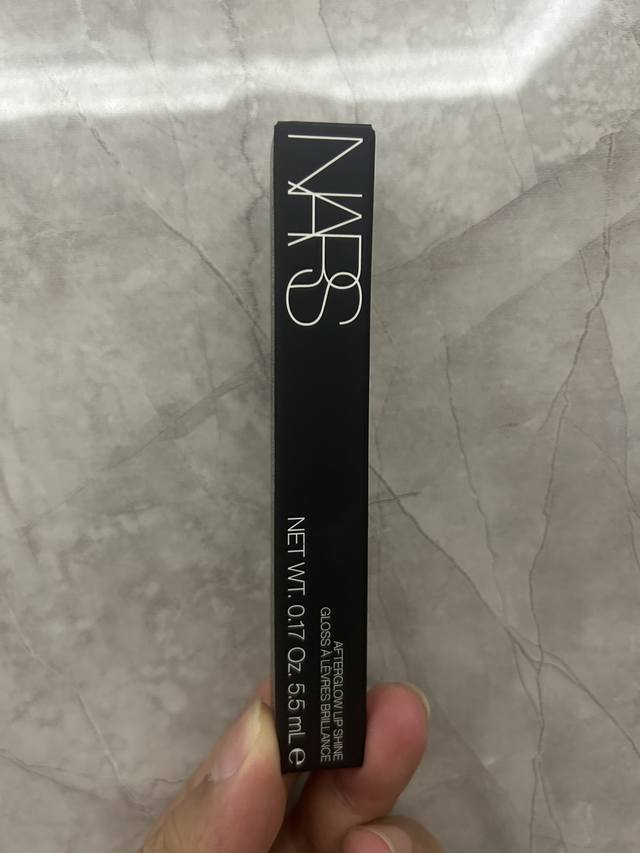 High-end quality Nars pink gold lip glaze! Color number: 275#Nympho Almond Mocha