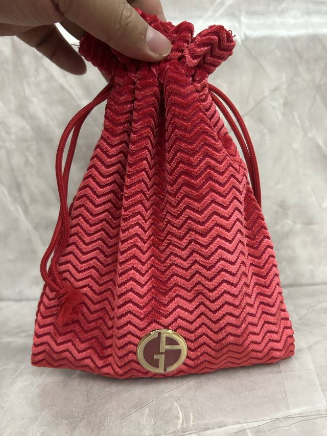 High-end quality Armani perfume sample set of four with a drawstring bag! Conta