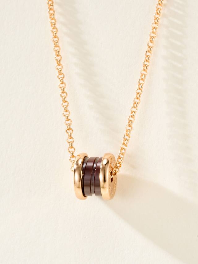 I really like this necklace. This small coffee ceramic necklace. . No tips. Th