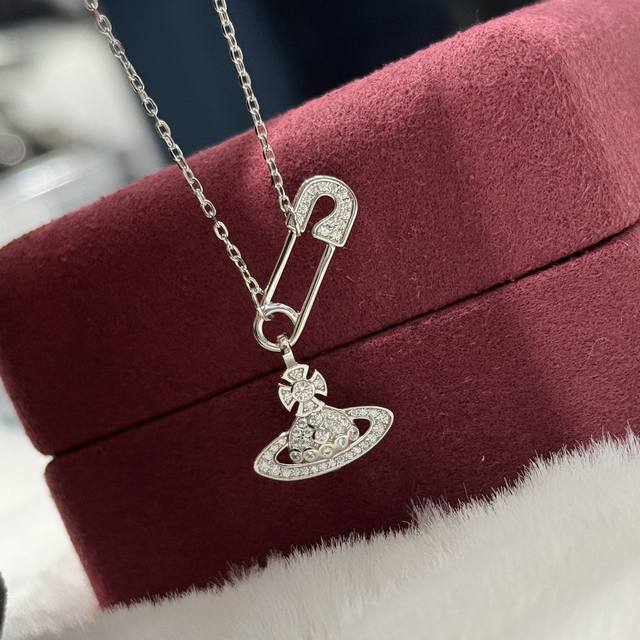 A4146 Popular Vivienne Saturn Planet Brooch Necklace. What's a must-have item fo