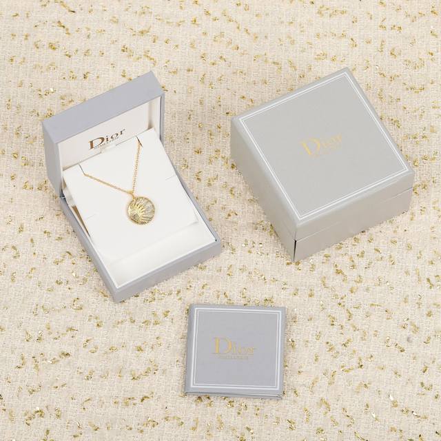 204016 We offer a sun, moon, and stars sweater necklace. Price: 60, 200. Large q