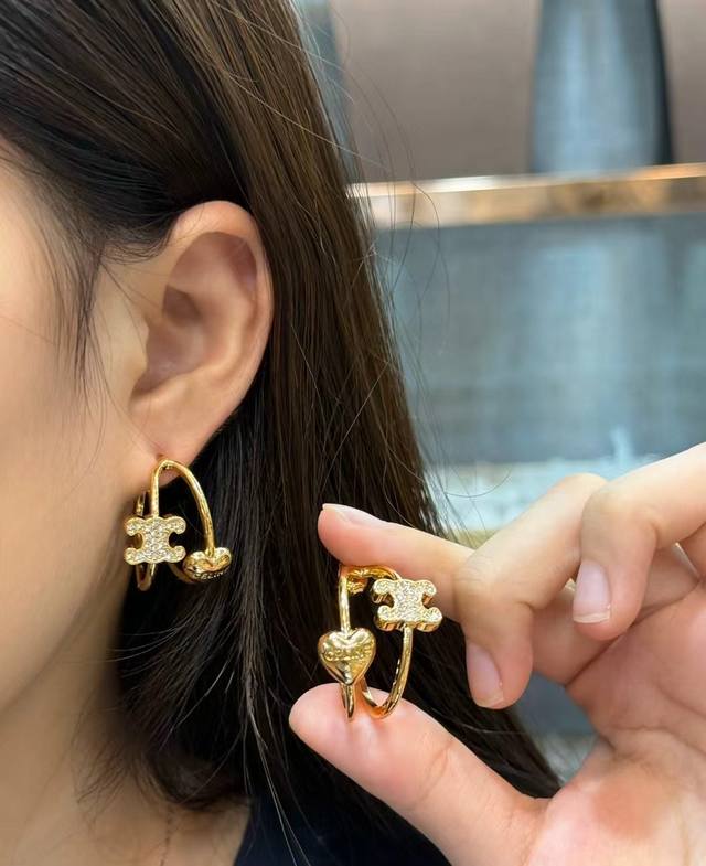 Celine Heart Arc de Triomphe Gold Curved EarringsCe Heart Arc de Triomphe Gold C