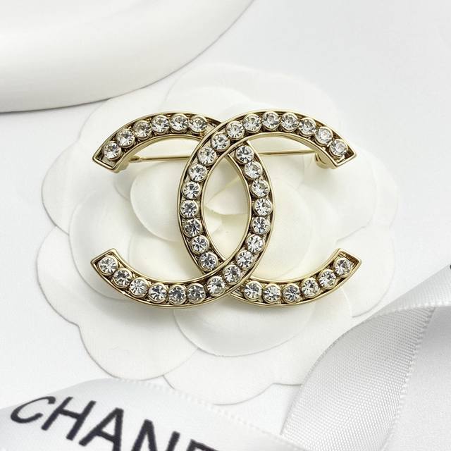 Code A753 Chanel brooch hot seller Chan 25 shimmering light gold double C brooc