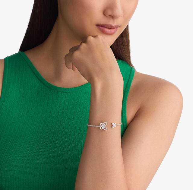 V Graff's new version of the butterfly open bracelet in gold. This high-end jewe