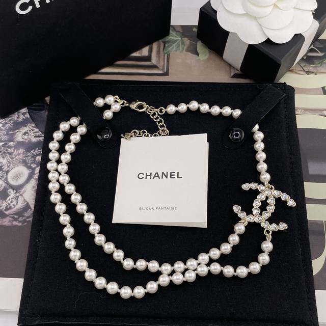 We're featuring a large, heart-shaped, one-and-a-half-layer pearl necklace for
