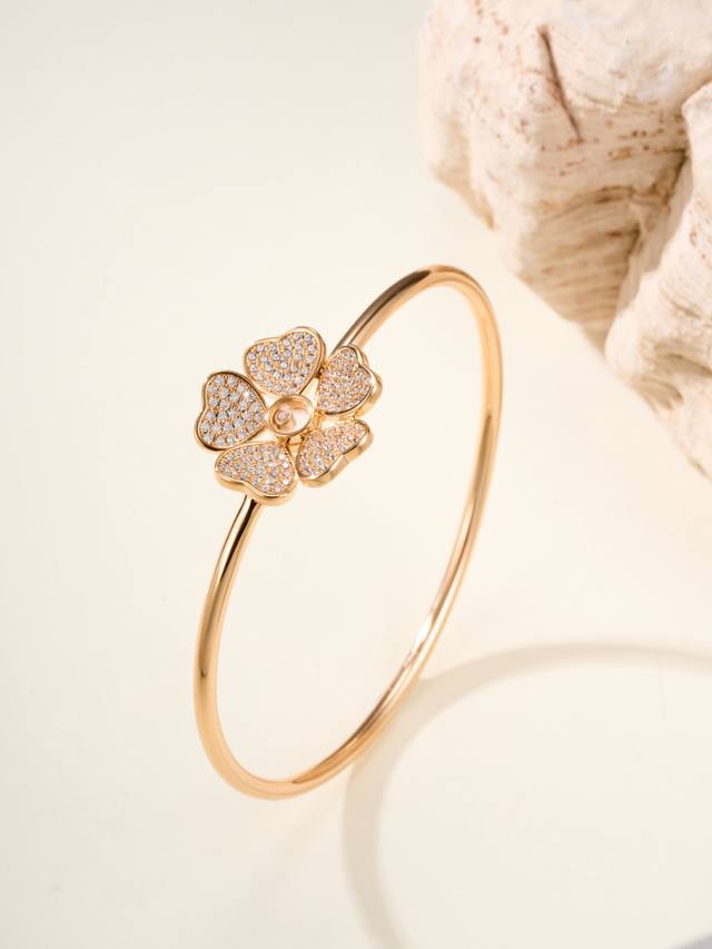 Chopard's Hearts Flowers bracelet features Chopard's signature heart shape, with