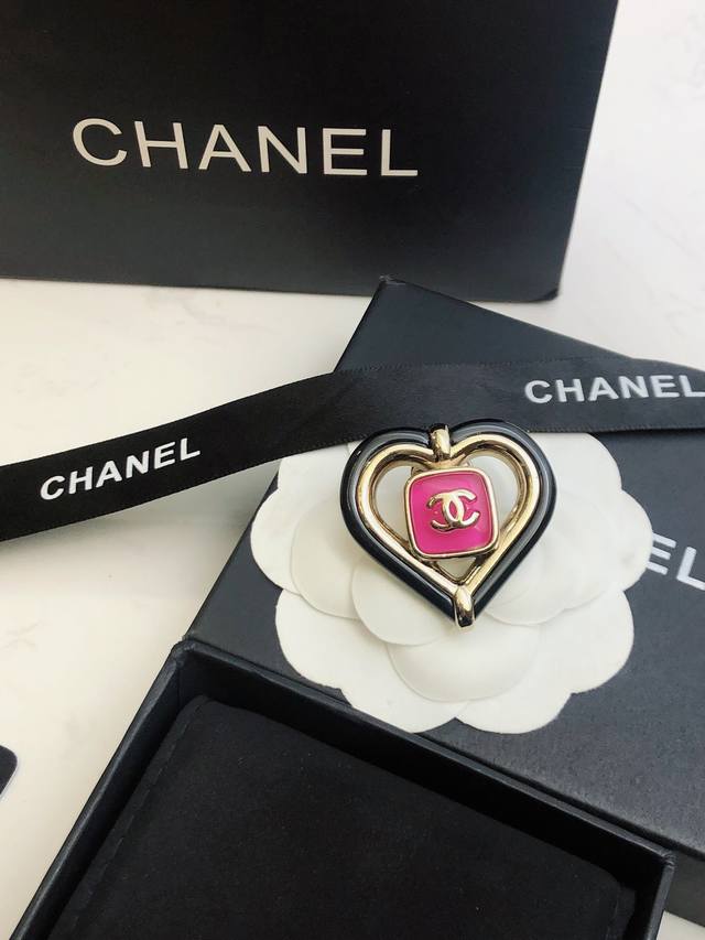 Chanel's new brooch features a hollow heart and double C design. Its minimalist
