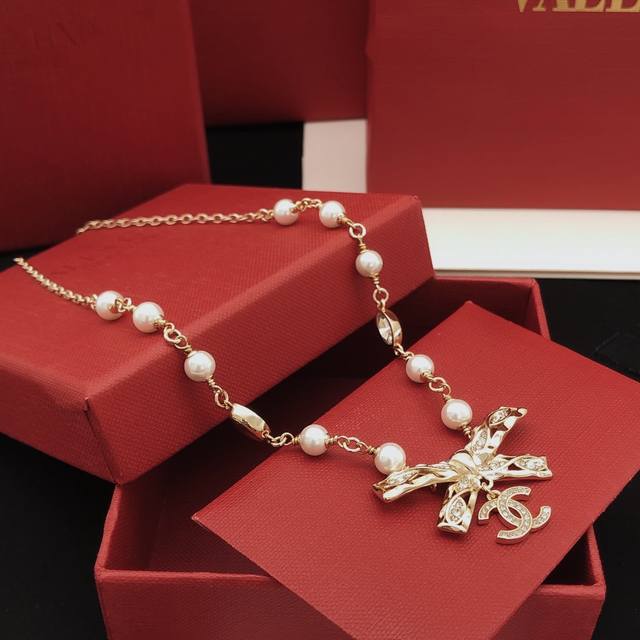 No. Xxl0203 24 New Jewelry Light Gold Bow Diamond Pearl Necklace Short Chain Ch