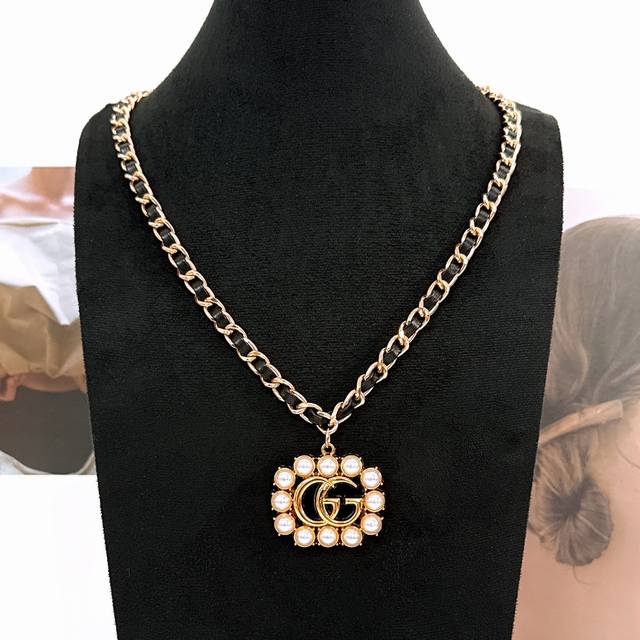 Gg pearl and rhinestone inlaid braided chain necklace